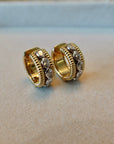 Fluted 18K yellow and white gold hoop earrings with natural pear diamonds
