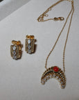 18K yellow gold fluted moon with coral gemstone and natural round brilliant diamonds pendant necklace and small diamond hoop earrings in 18K yellow gold
