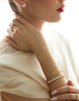 Diamond bangle with reverse set Canadian diamonds 18K yellow gold