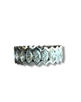 The Nijma M Fine Jewelry Marquise Diamond Eternity Ring in 18K white gold showcases marquise diamonds set in a zigzag pattern, shown on a white background with a subtle shadow.
