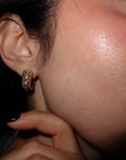 Fluted 18K yellow and white gold hoop earrings with natural pear diamonds