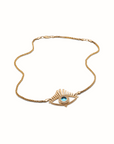 Diamond gold blue topaz evil eye pendant necklace.
