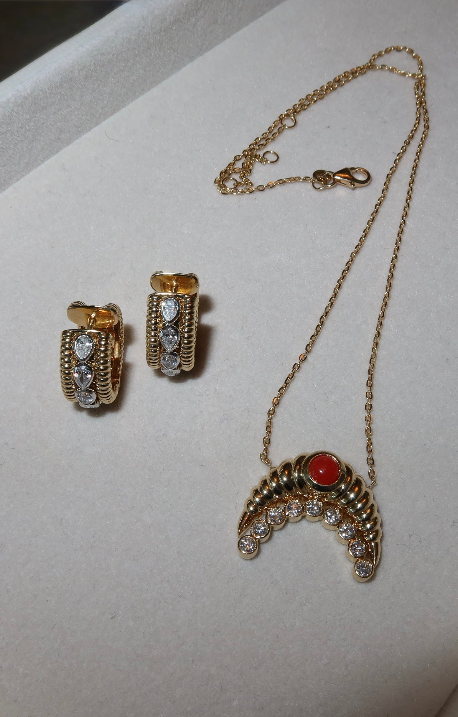 18K yellow gold fluted moon with coral gemstone and natural round brilliant diamonds pendant necklace and small diamond hoop earrings in 18K yellow gold