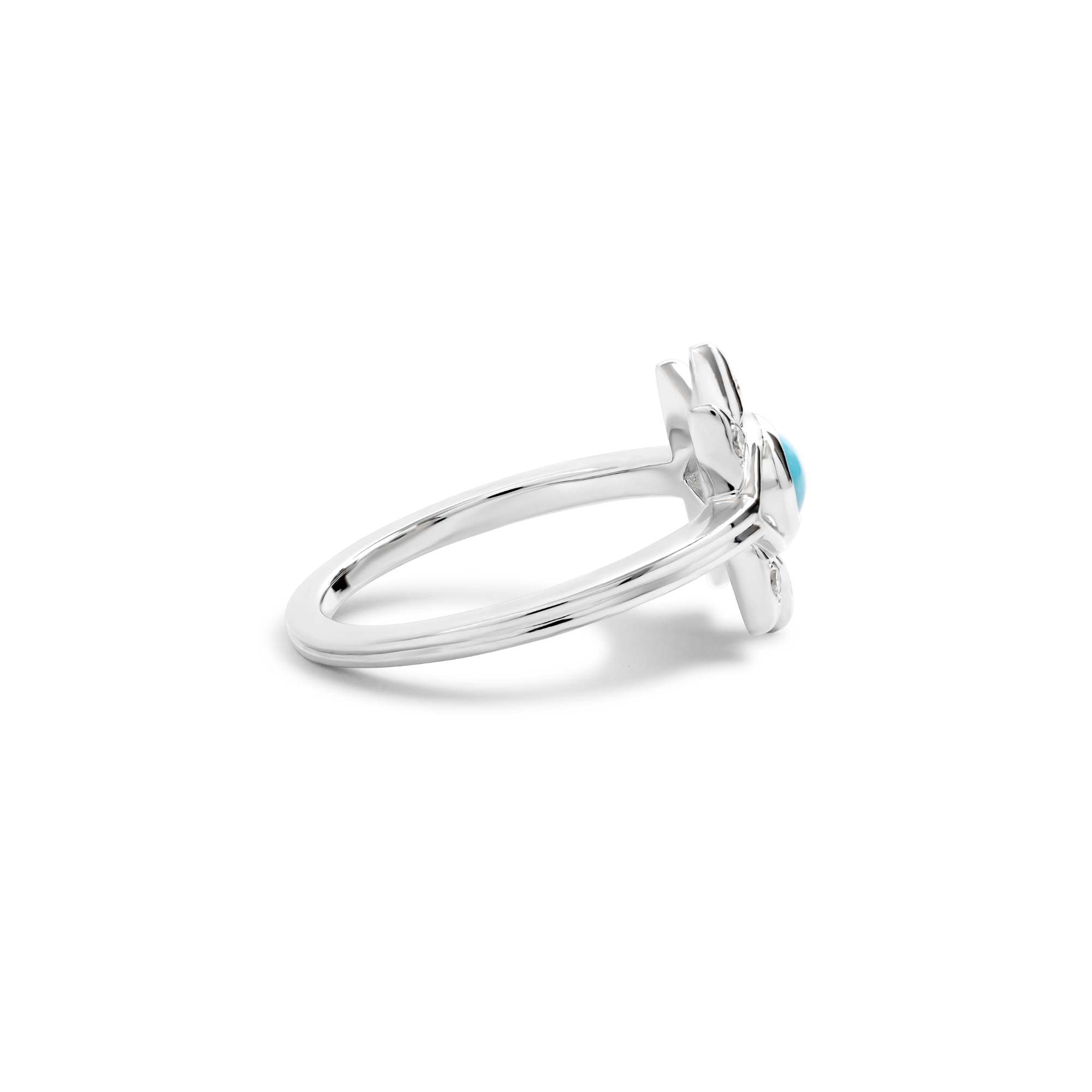 Silver ring with a blue gemstone on a white background