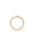 yellow gold single baguette diamond ring with gold bead detail and cutouts