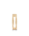 yellow gold single baguette diamond ring with gold bead detail and cutouts
