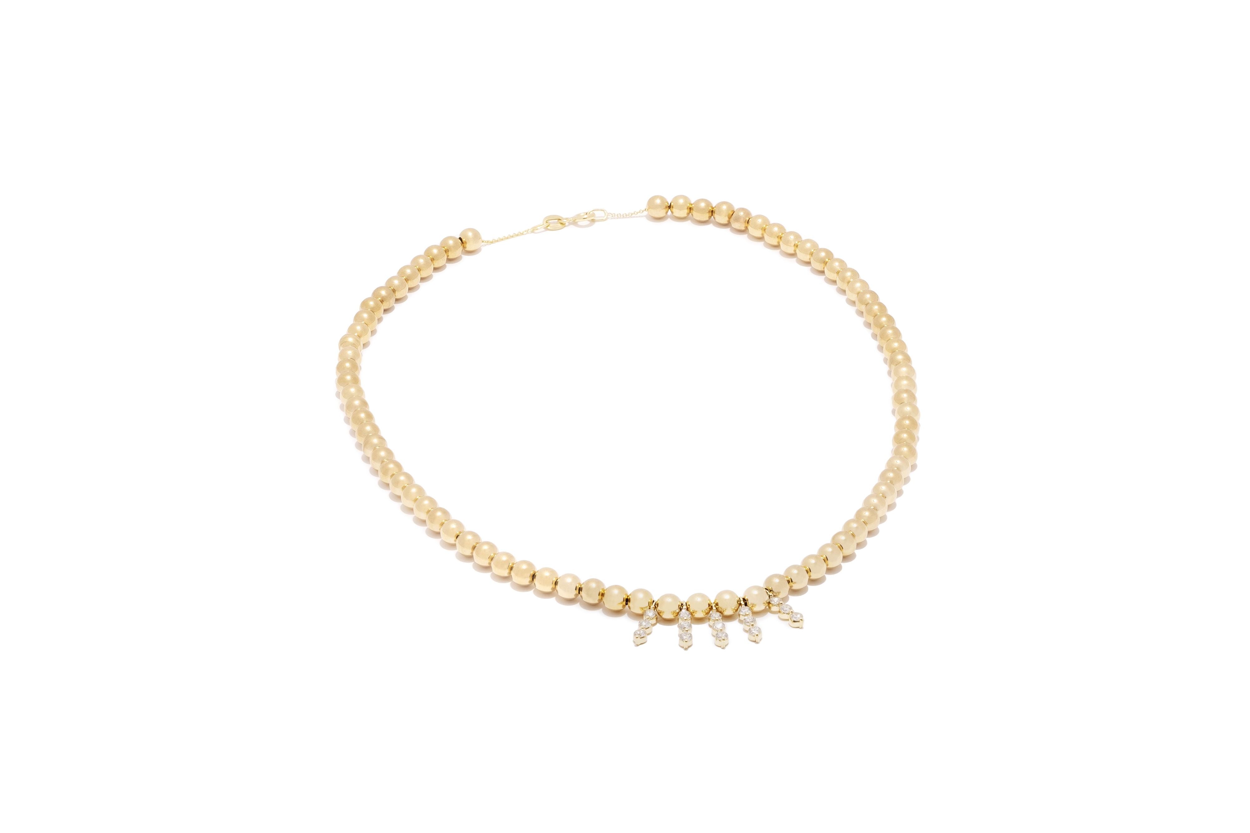 yellow gold necklace with beads and diamonds