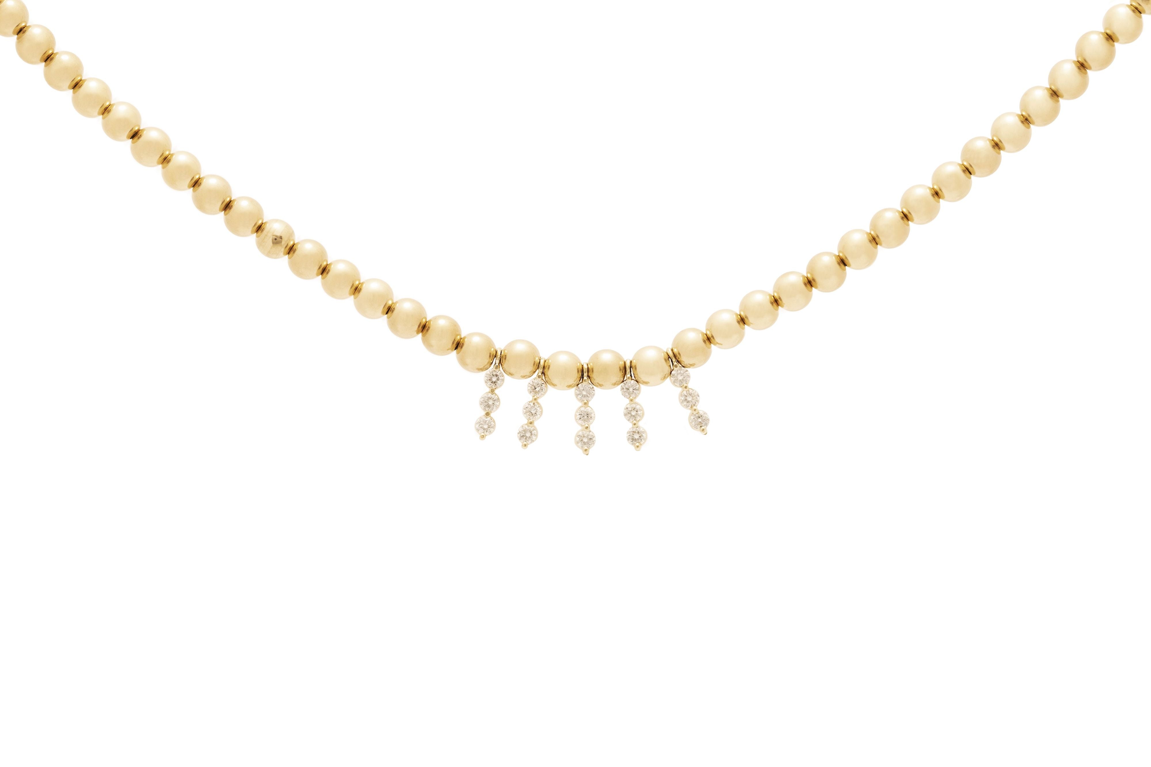 yellow gold necklace with beads and diamonds