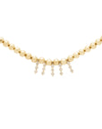 yellow gold necklace with beads and diamonds